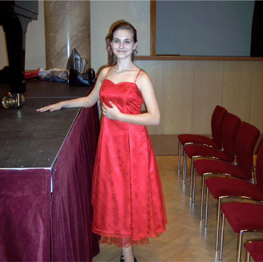 Tereza in red dresses.