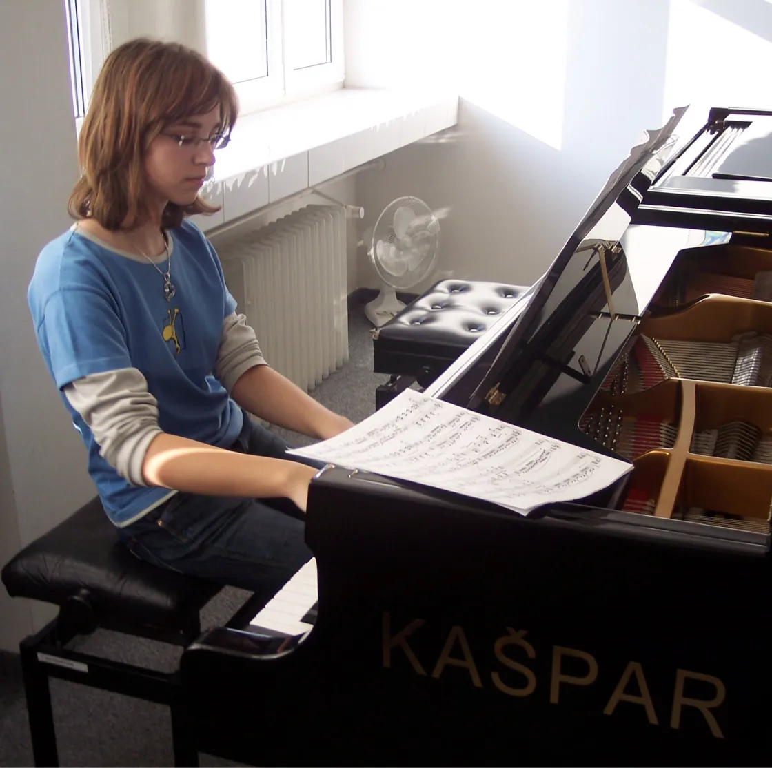 Year 1999 - Terka learning to play piano.
